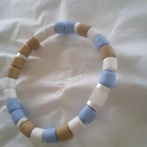 Bracelet...sretch bracelet, mini cube shape center bead...7" inches